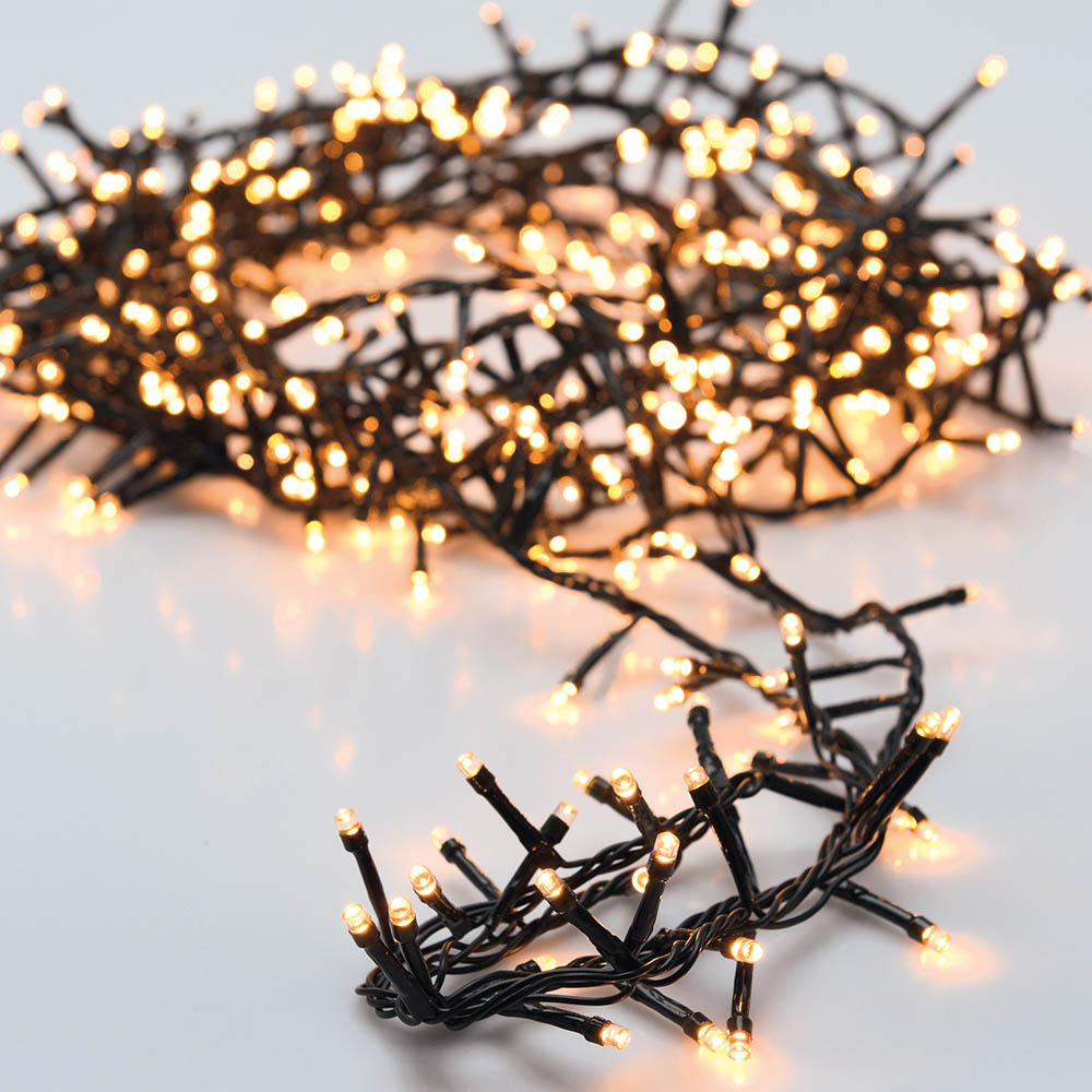 Grinalda "tipo espinho" multifunções 700 leds branco quente ip44 17m_0