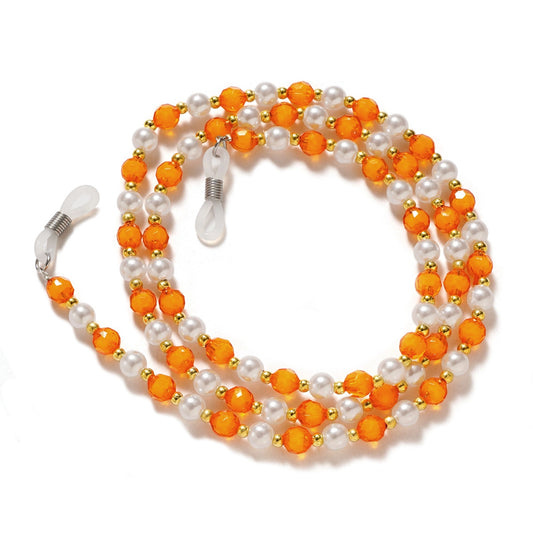 A chain for glasses, beads, an orange pendant_0