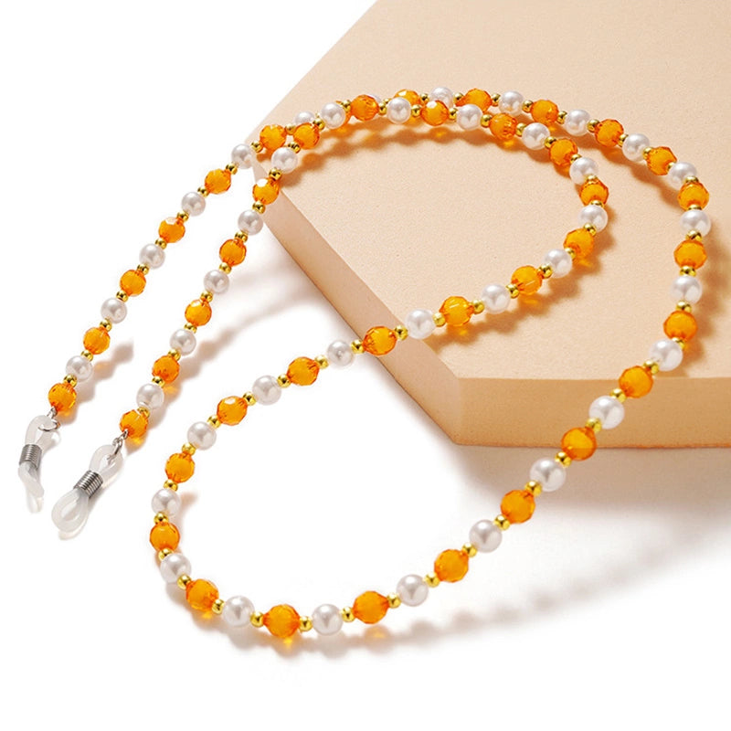 A chain for glasses, beads, an orange pendant_1