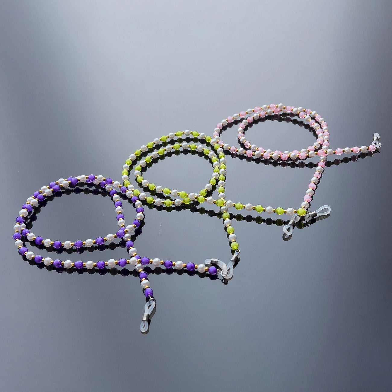 A chain for glasses, beads, an orange pendant_3